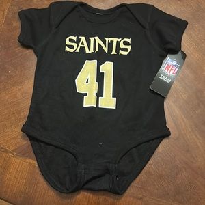 NWT saints onesie